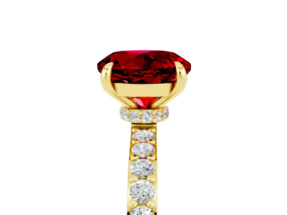 Round Cut Ruby Solitaire Engagement Ring with Pavé Band and Four-Prong Setting Yellow gold