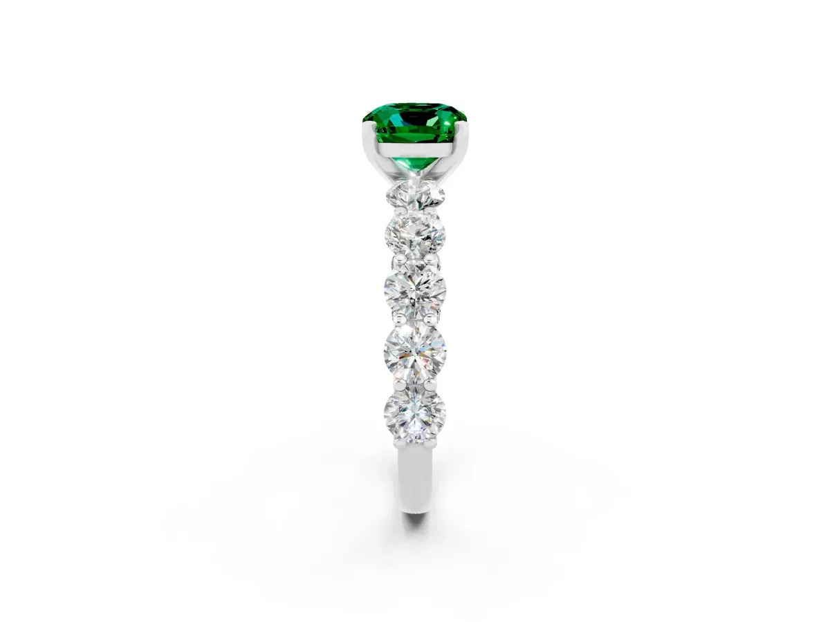Cushion Cut Emerald Prong Setting with Side Stones on a Pave Band Platinum
