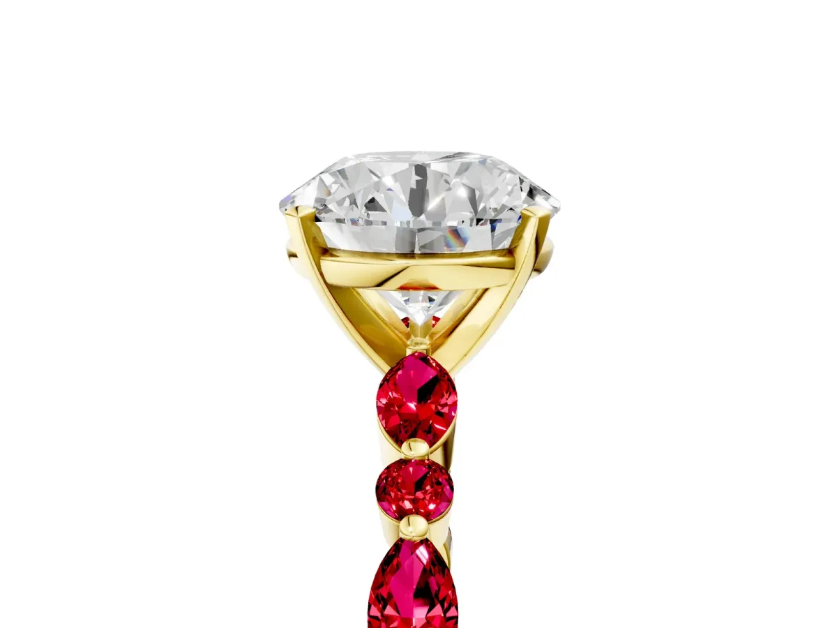 Round Cut Diamond Ring with Marquise and Round Ruby Side Stones and Four-Prong Setting Yellow gold
