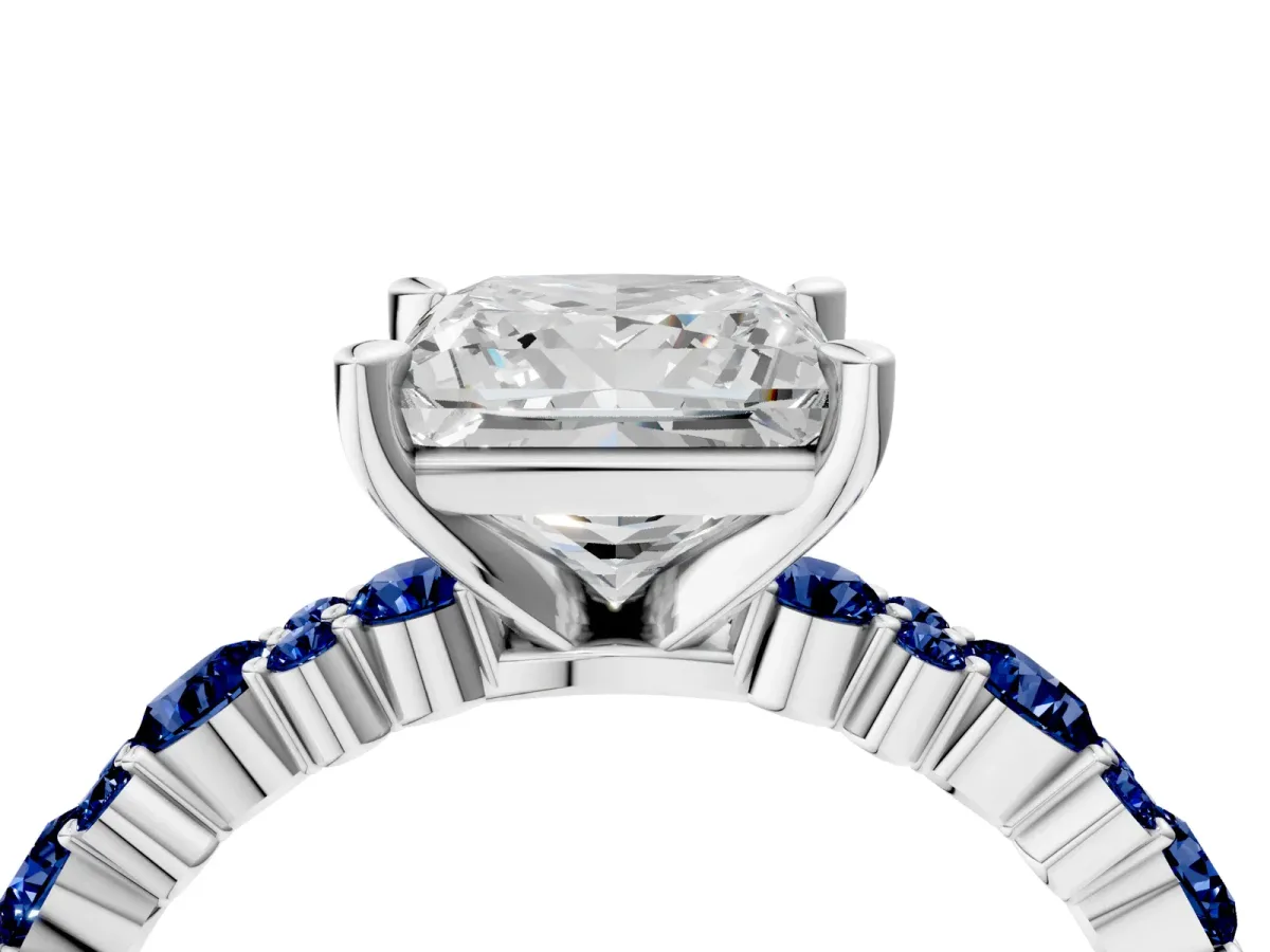 Princess Cut Diamond Side Stone Solitaire Ring with Round Blue Sapphire and Four-Prong Setting Silver
