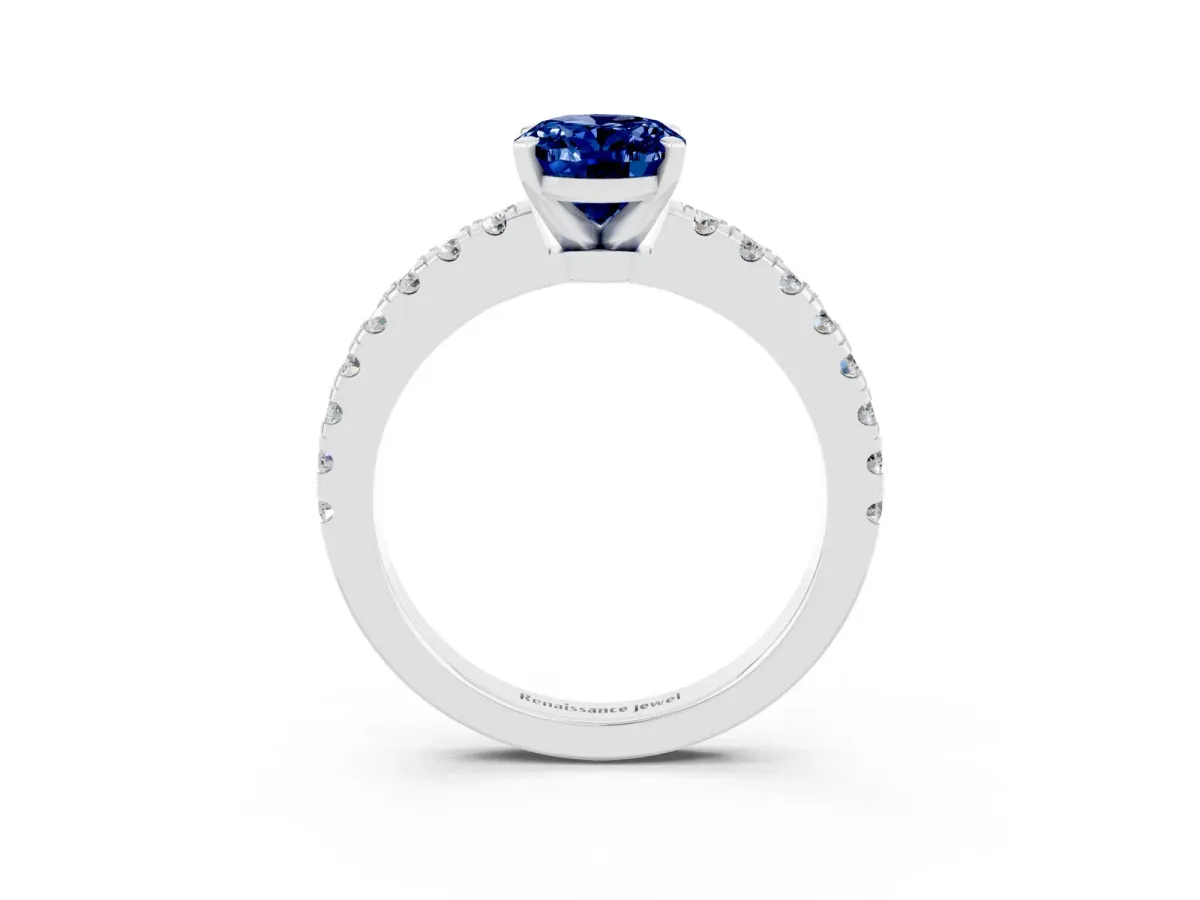 Oval Cut Solitaire Blue Sapphire with Pavé Band and Four-Prong Setting Silver