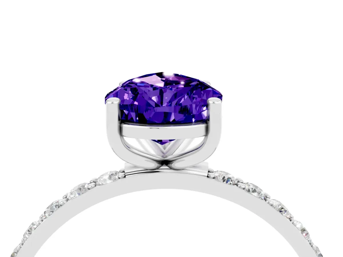 Pear Cut Tanzanite Solitaire Ring with Round Pavé Band and Prong Setting Silver