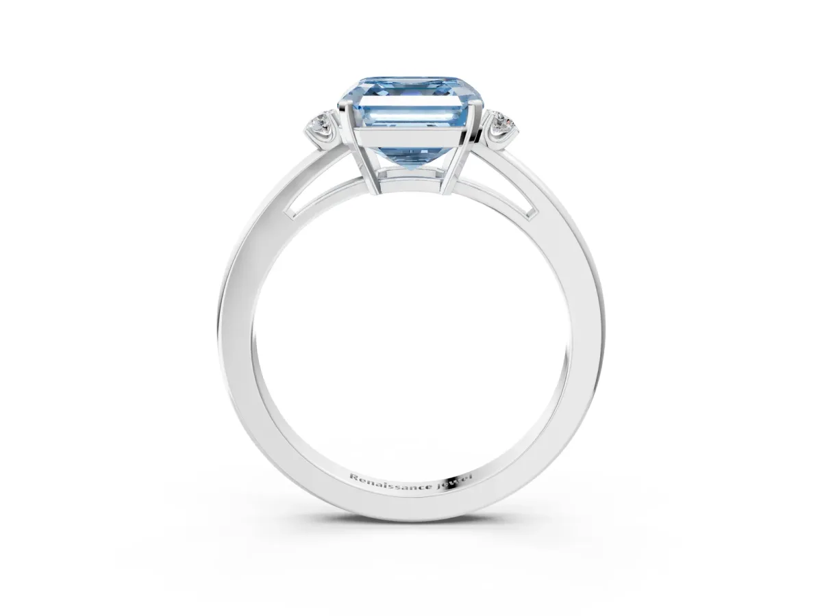 Fancy Blue Asscher Cut Cut Three-Stone Solitaire Ring with Round Accent Diamonds and Four-Prong Setting Platinum
