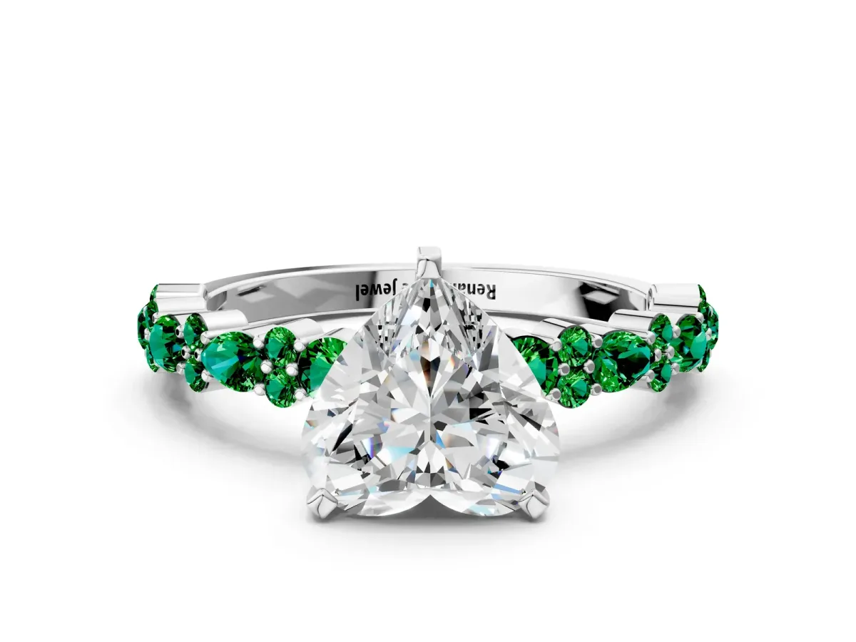 Heart Cut Diamond Side Stone Solitaire Ring with Round Emerald and Four-Prong Setting Platinum