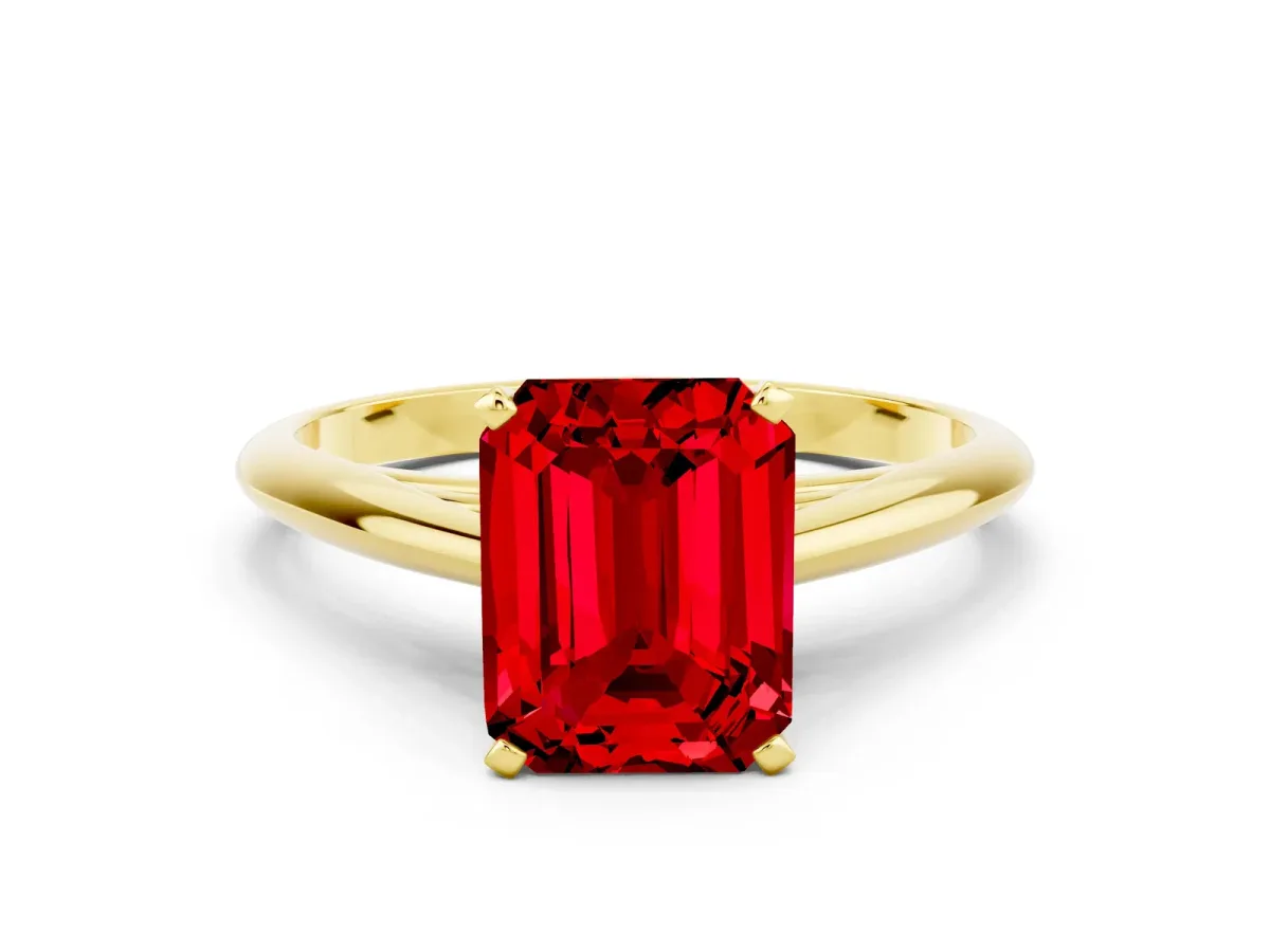 Emerald Cut Ruby Solitaire Engagement Ring with Cathedral Setting and Four-Prong Mount Yellow gold