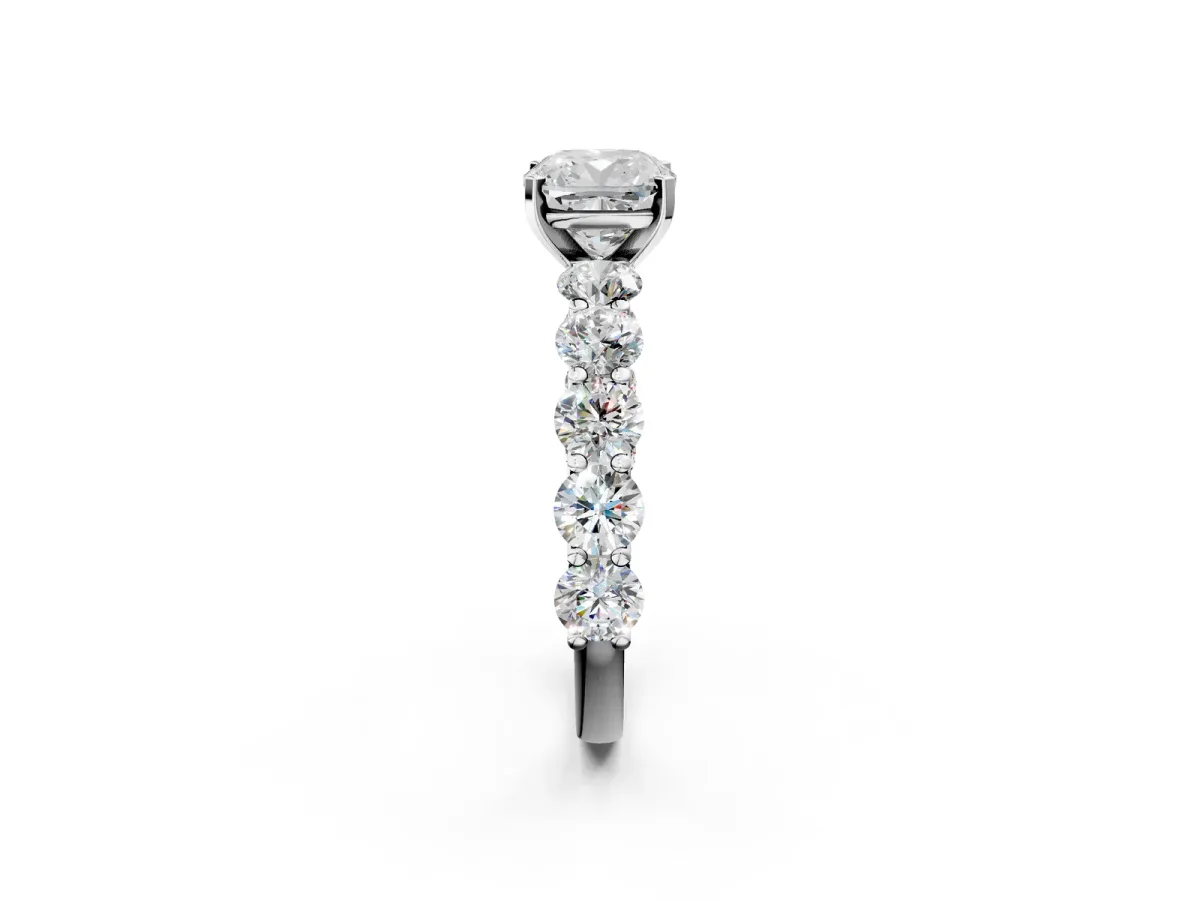 Cushion Cut Diamond Prong Setting with Side Stones on a Pave Band Platinum