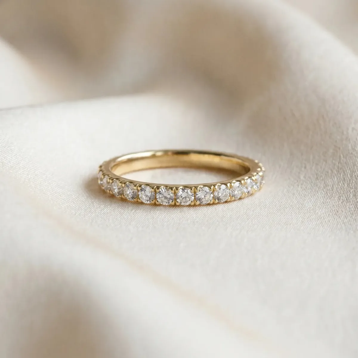 Round Cut Diamond Eternity Band with Shared Prong Setting Yellow gold