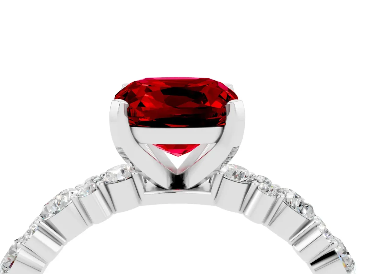 Cushion Cut Ruby Side Stone Solitaire Ring with Round and Four-Prong Setting White gold