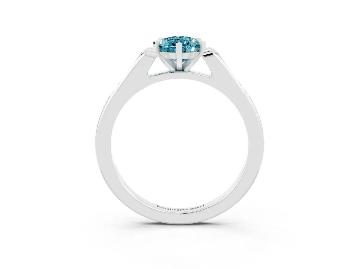 Pear Cut Blue Topaz Solitaire Ring with Channel Set Round Band and Prong Setting Silver