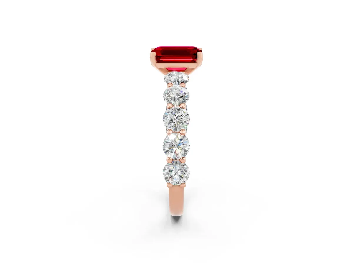 Emerald Cut Ruby Prong Setting with Side Stones on a Pave Band Rose gold