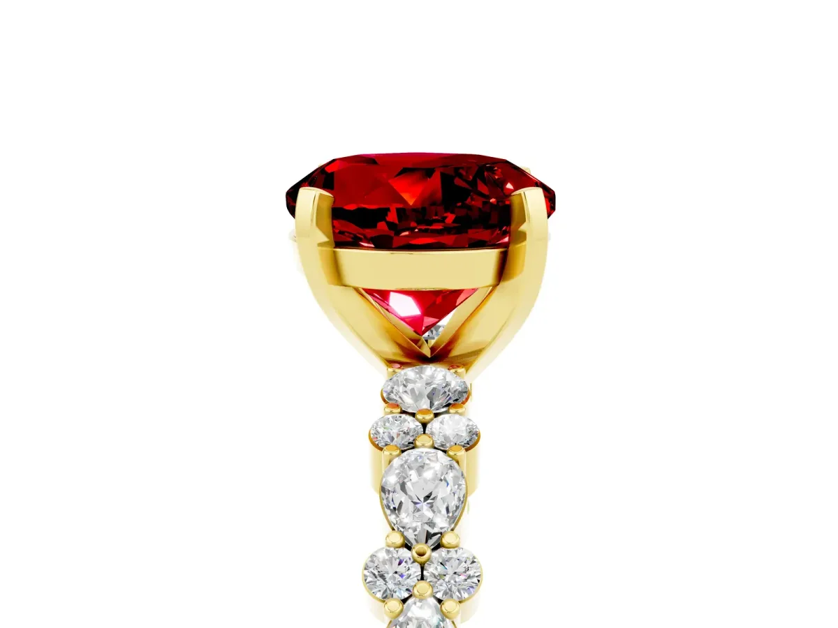 Round Cut Ruby Side Stone Solitaire Ring with Round and Four-Prong Setting Yellow gold