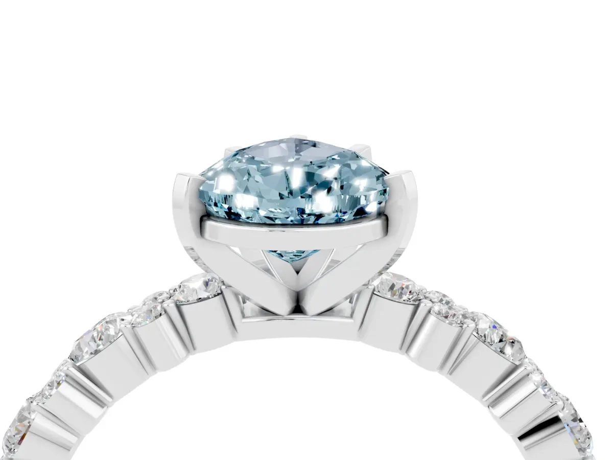 Pear Cut Aquamarine Side Stone Solitaire Ring with Round and Four-Prong Setting Silver