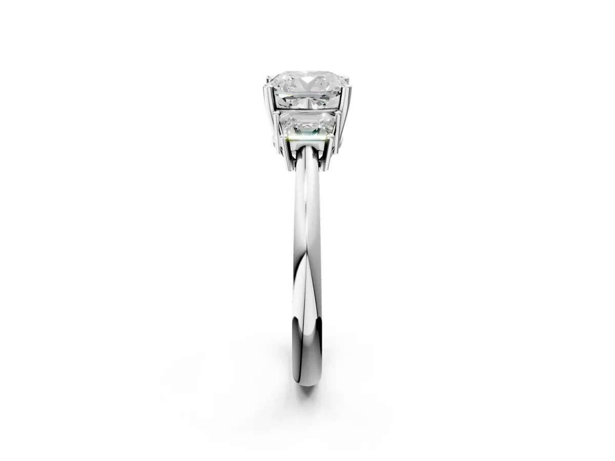 Cushion Cut Diamond Three-Stone Ring with Trapezoid Side Stones and Prong Setting White gold
