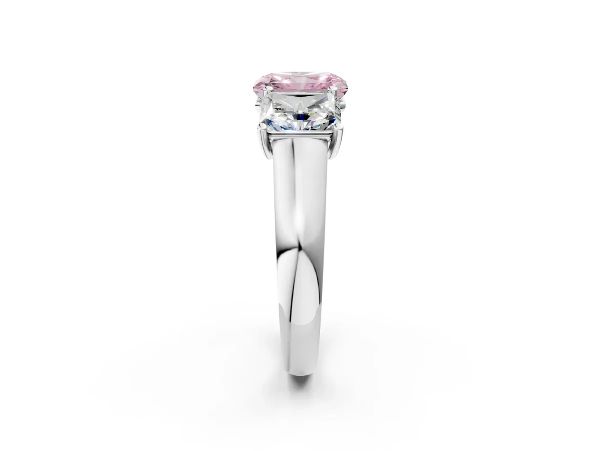 Fancy Pink Radiant Cut Three-Stone Diamond Ring with Prong Setting on a Classic Band Platinum