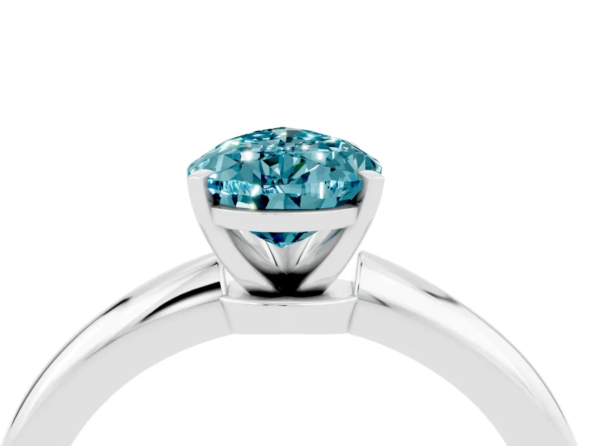 Pear Cut Blue Topaz Solitaire Ring with Six-Prong Setting and Classic Band Silver