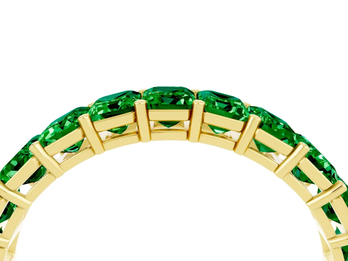 Emerald Cut Emerald Eternity Band with Shared Prong Setting Yellow gold