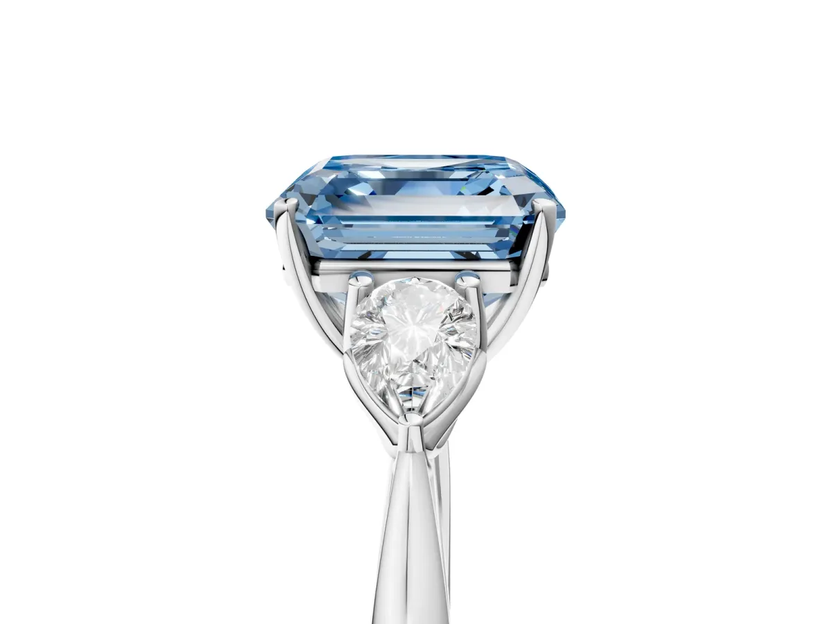 Fancy Blue Three-Stone Asscher Cut Diamond Ring with Pear Side Stones in Four-Prong Setting Platinum