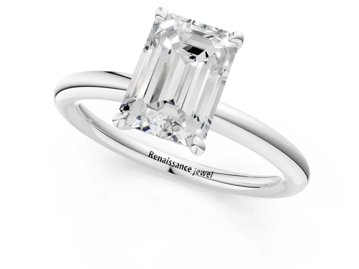 Emerald Cut Diamond Solitaire Ring with Thin Band and Four-Prong Setting White gold