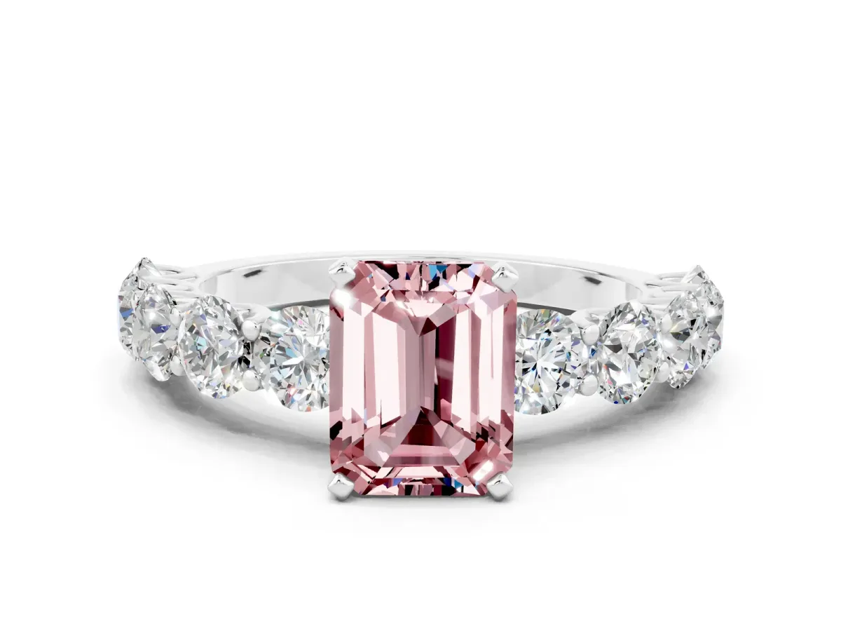 Emerald Cut Morganite Prong Setting with Side Stones on a Pave Band Platinum