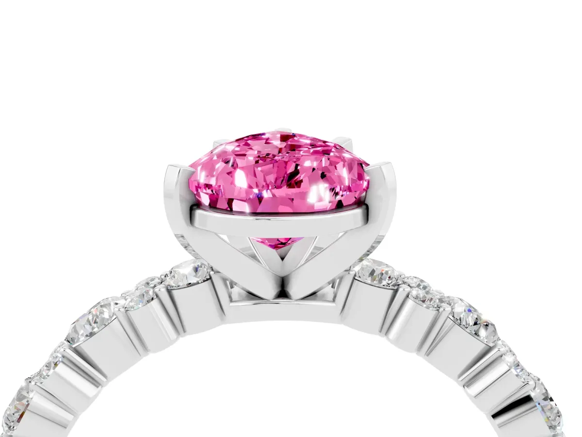 Pear Cut Pink Sapphire Side Stone Solitaire Ring with Round and Four-Prong Setting Silver