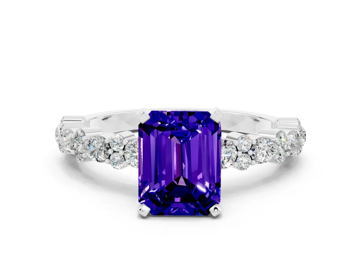 Emerald Cut Tanzanite Side Stone Solitaire Ring with Round and Four-Prong Setting White gold