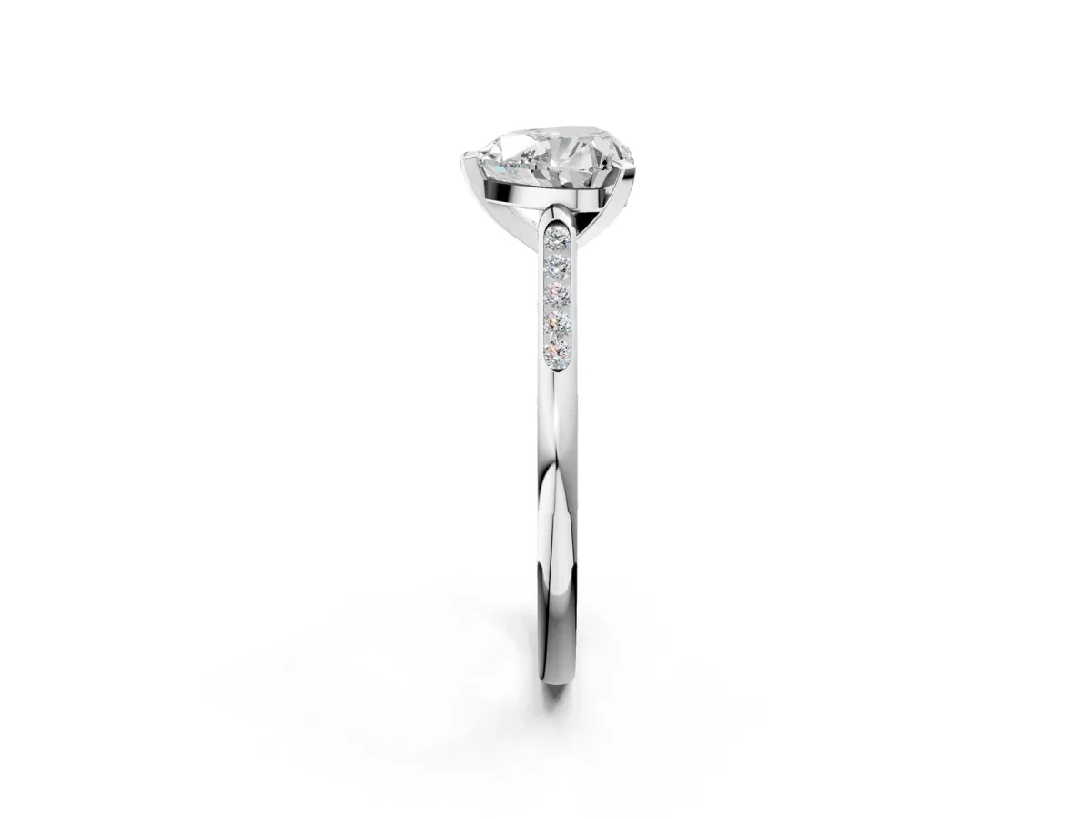 Heart Cut Diamond Solitaire Ring with Channel Set Round Band and Prong Setting Silver