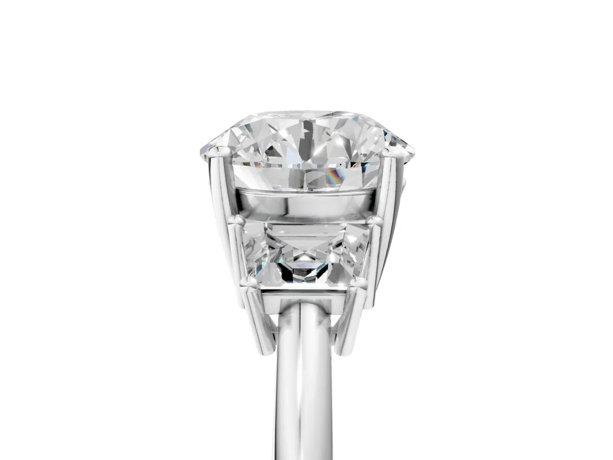Round Cut Diamond Three-Stone Ring with Trapezoid Side Stones and Prong Setting Platinum