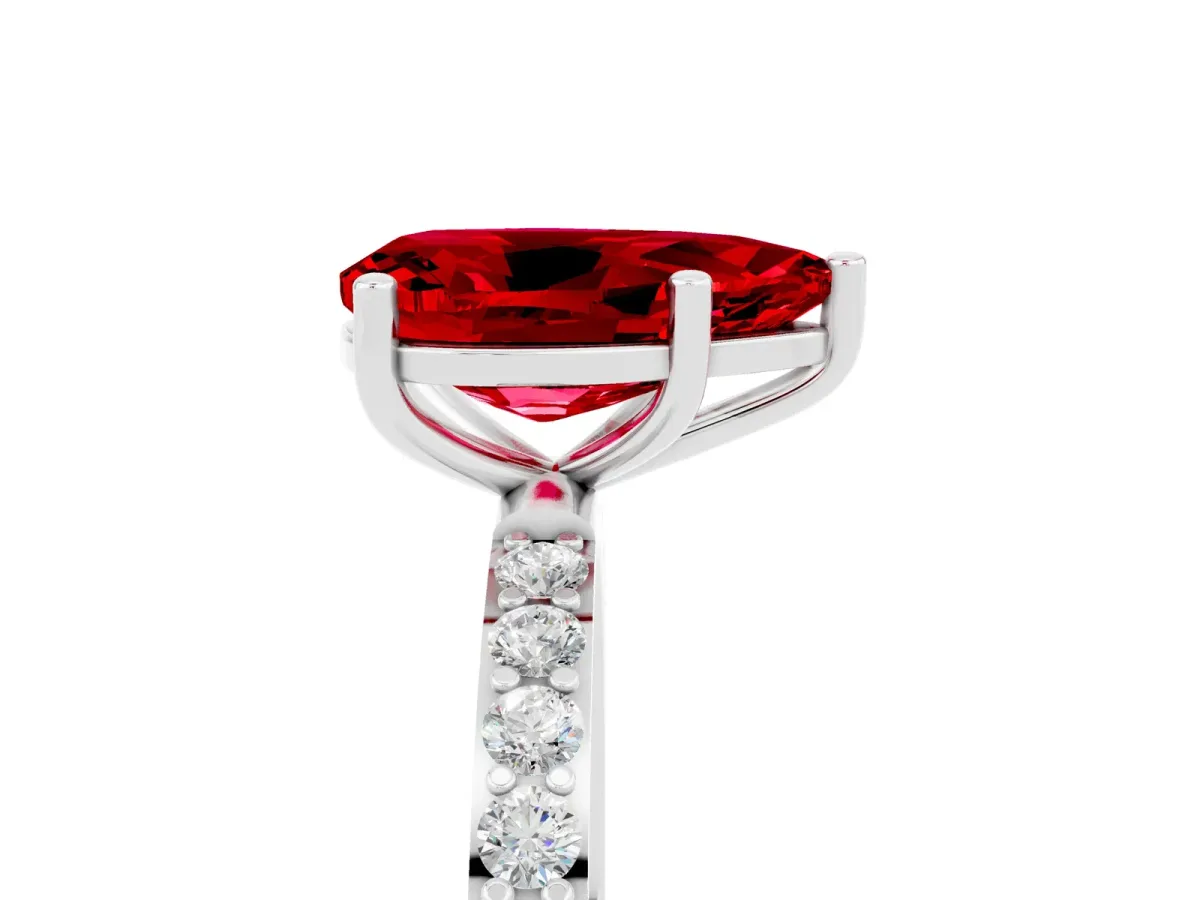 Pear Cut Ruby Solitaire Ring with Round Pavé Band and Prong Setting Silver