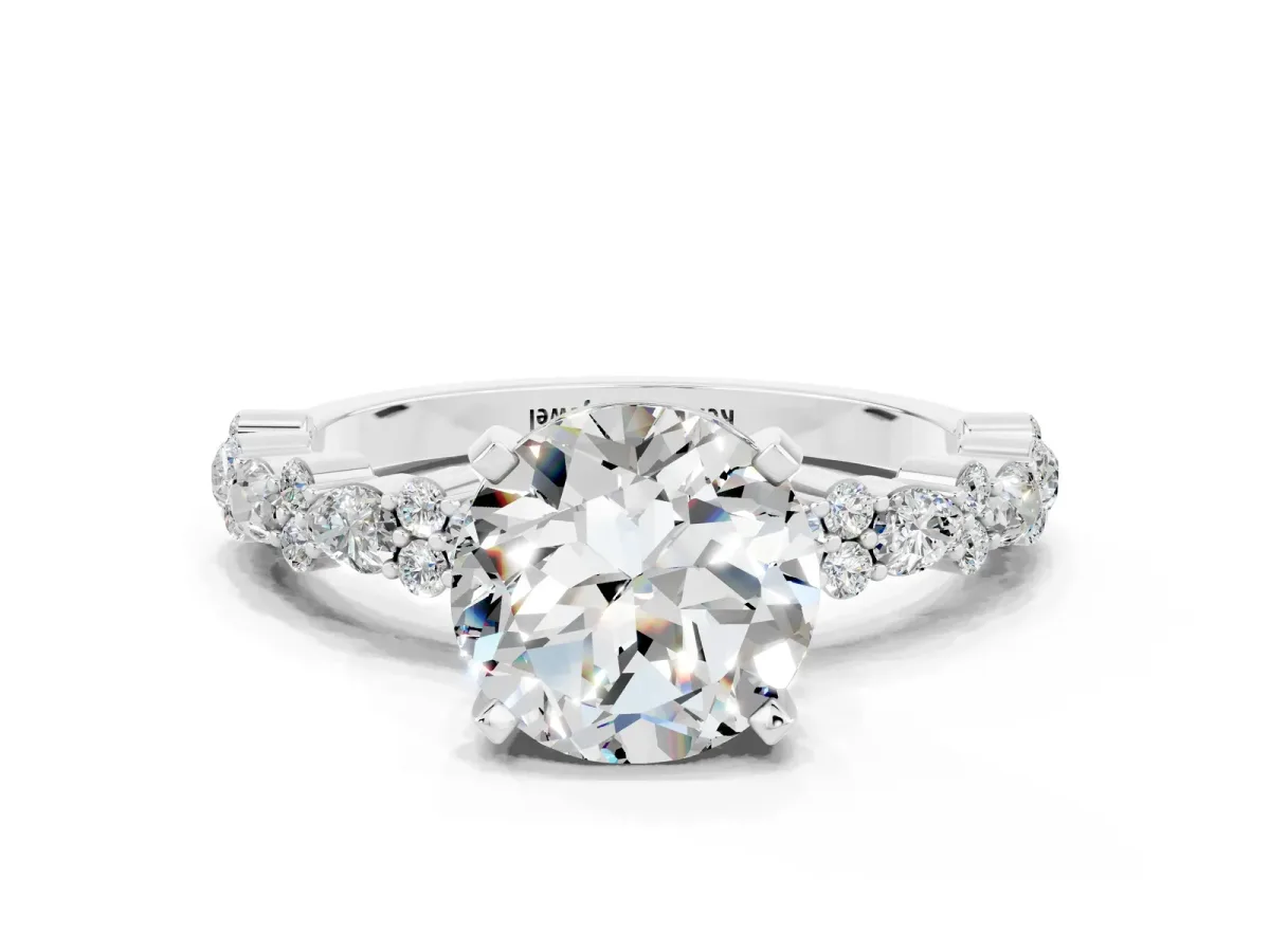 Round Cut Moissanite Side Stone Solitaire Ring with Round and Four-Prong Setting White gold