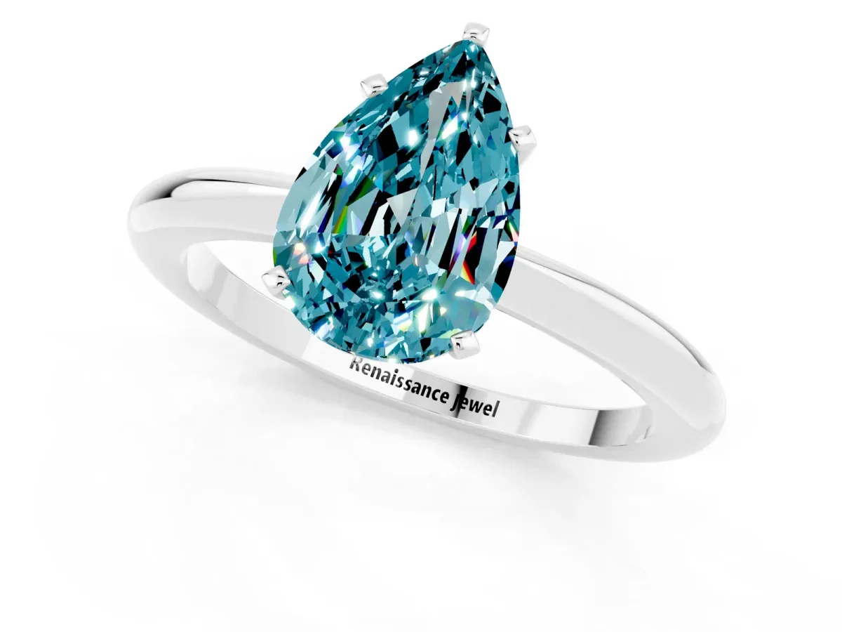 Pear Cut Blue Topaz Solitaire Ring with Six-Prong Setting and Classic Band Silver