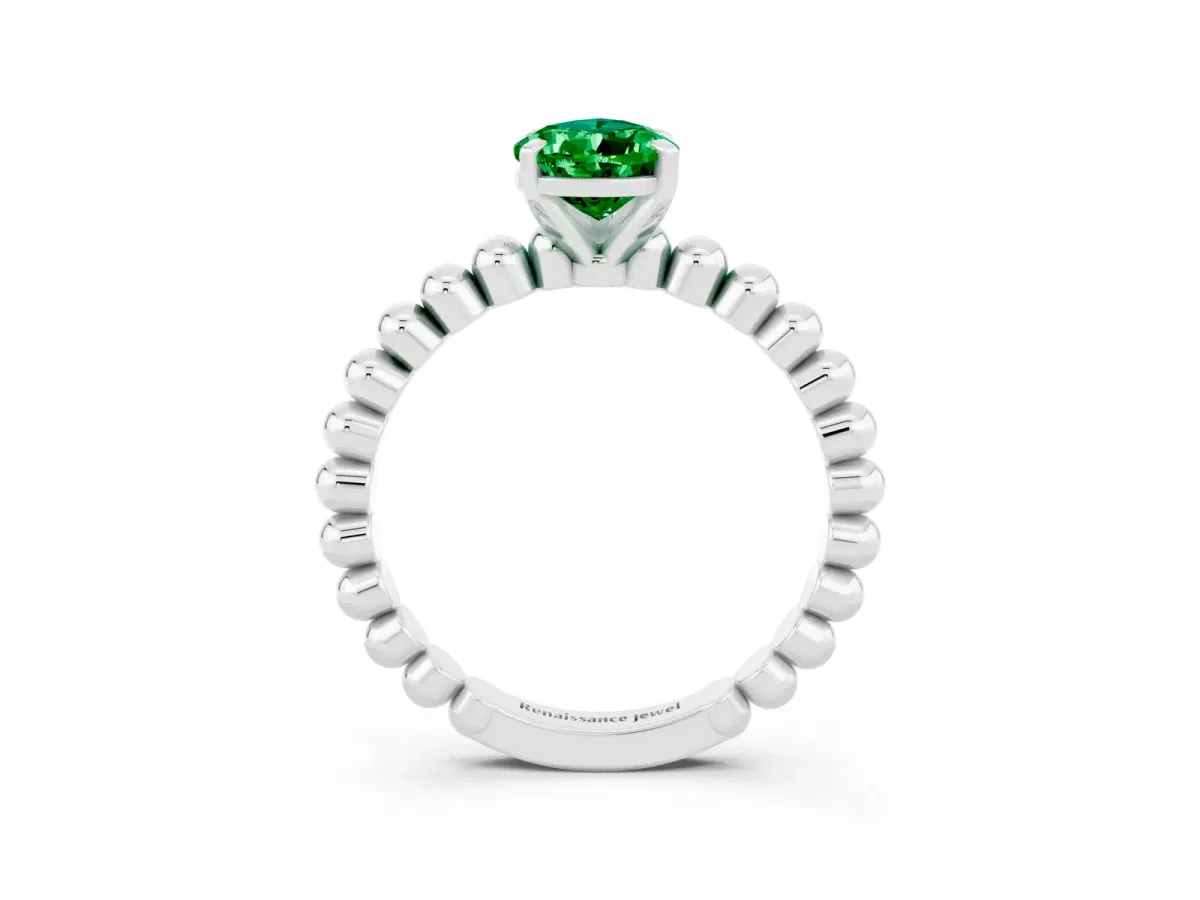 Pear Cut Emerald Solitaire Ring with Beaded Band and Prong Setting White gold