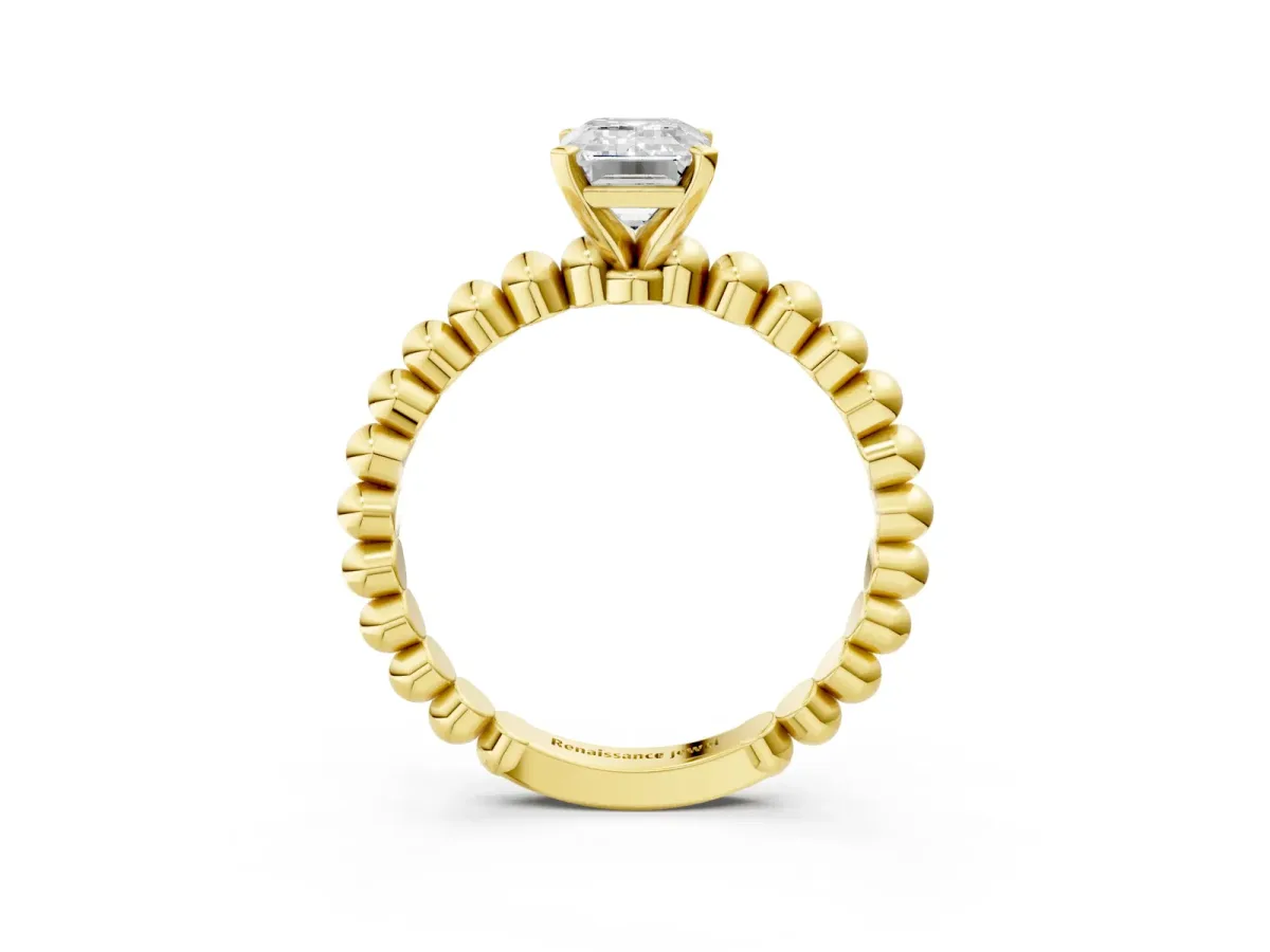 Emerald Cut Diamond Solitaire Ring with Beaded Band and Prong Setting Yellow gold