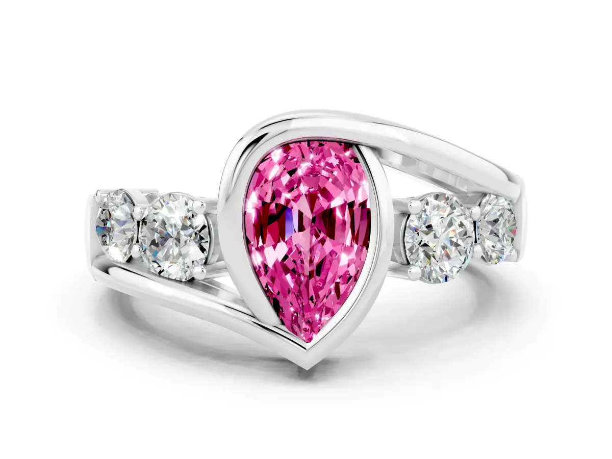 Bezel Set Pear Cut Pink Sapphire Bypass Ring with Round Accents Silver