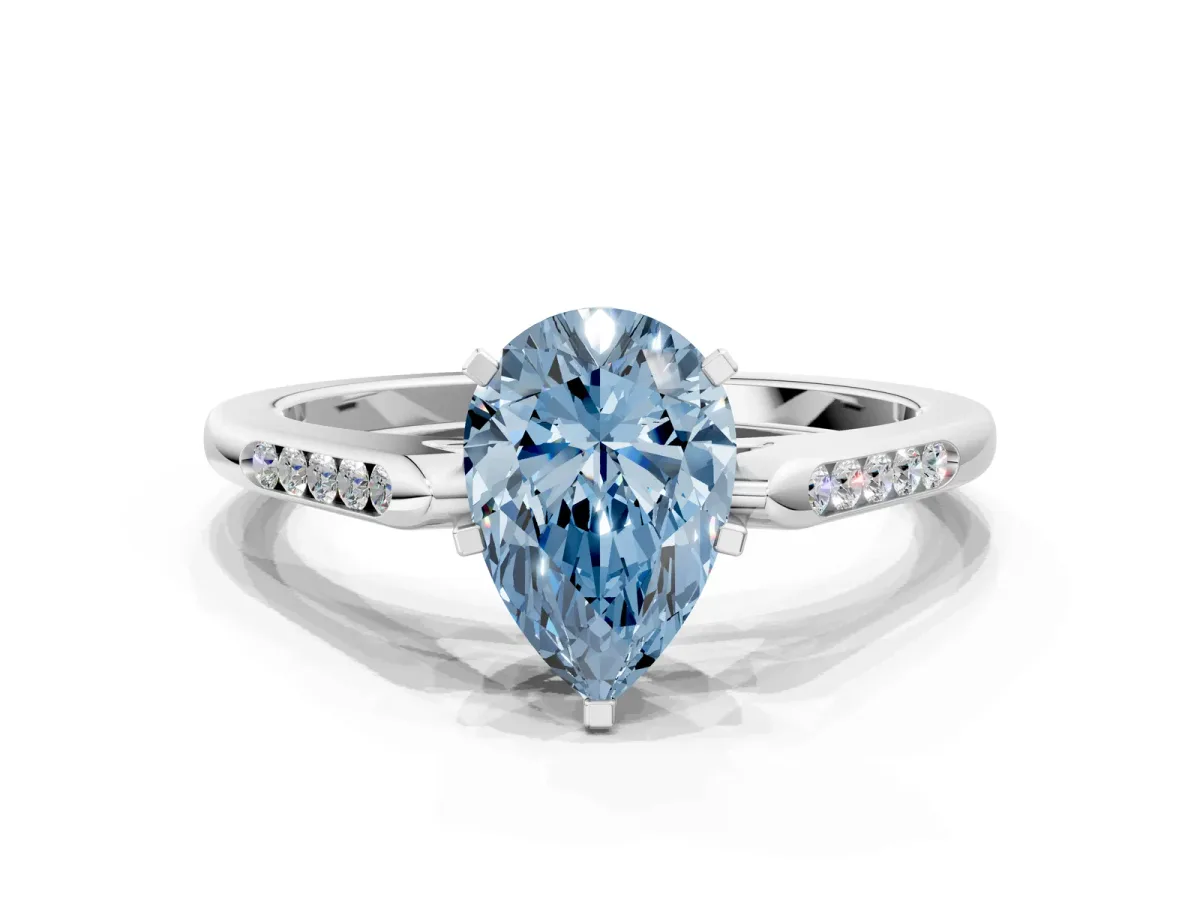 Fancy Blue Pear Cut Diamond Solitaire Ring with Channel Set Round Band and Prong Setting Silver
