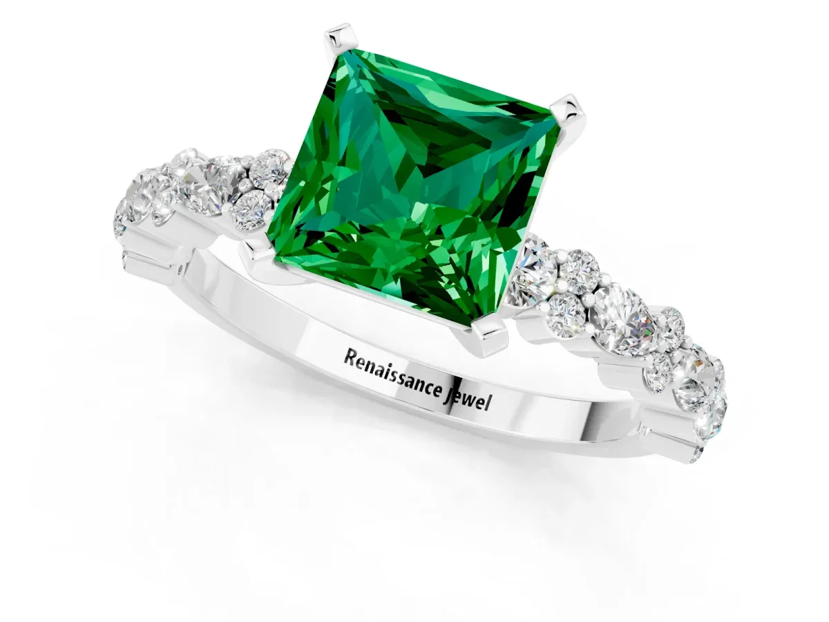 Princess Cut Emerald Side Stone Solitaire Ring with Round and Four-Prong Setting Silver