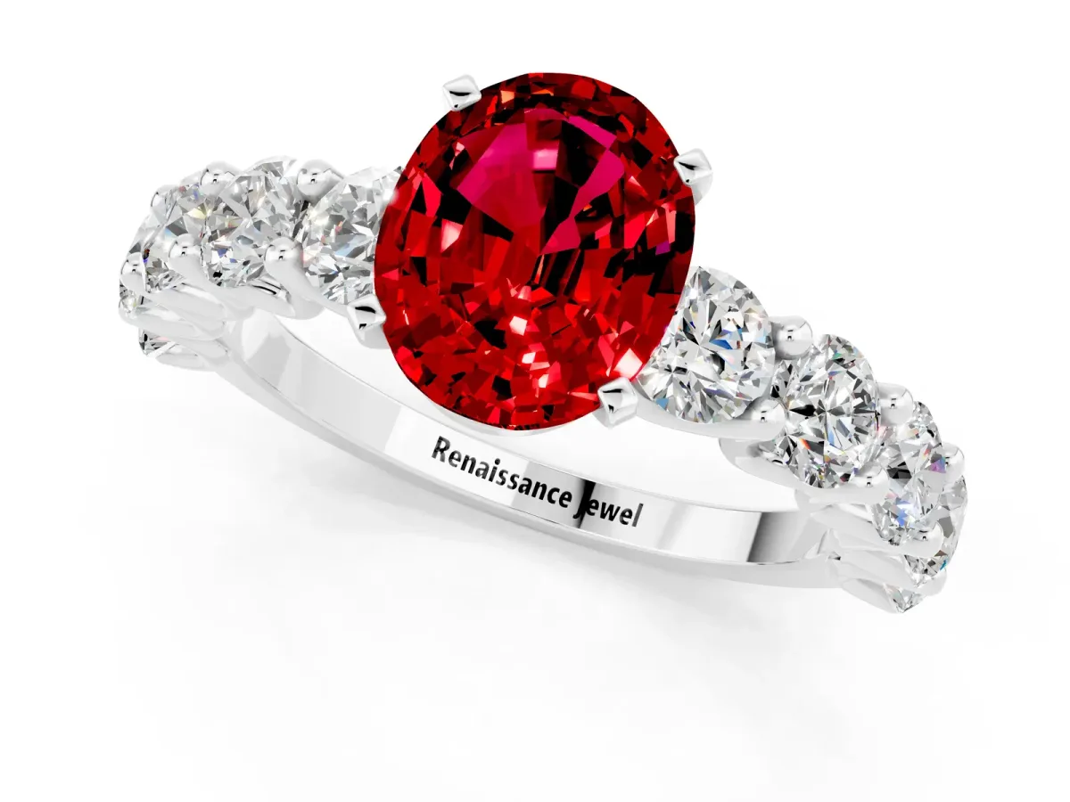 Oval Cut Ruby Prong Setting with Side Stones on a Pave Band Platinum