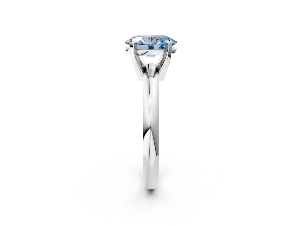 Fancy Blue Oval Cut Diamond Solitaire Engagement Ring with Round Band and Four-Prong Setting Silver