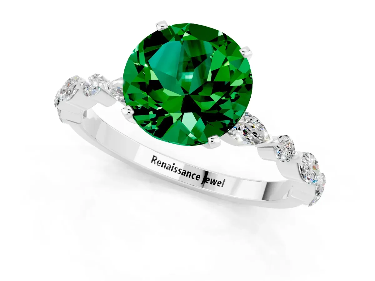 Round Cut Emerald Ring with Marquise and Round Side Stones and Four-Prong Setting Silver