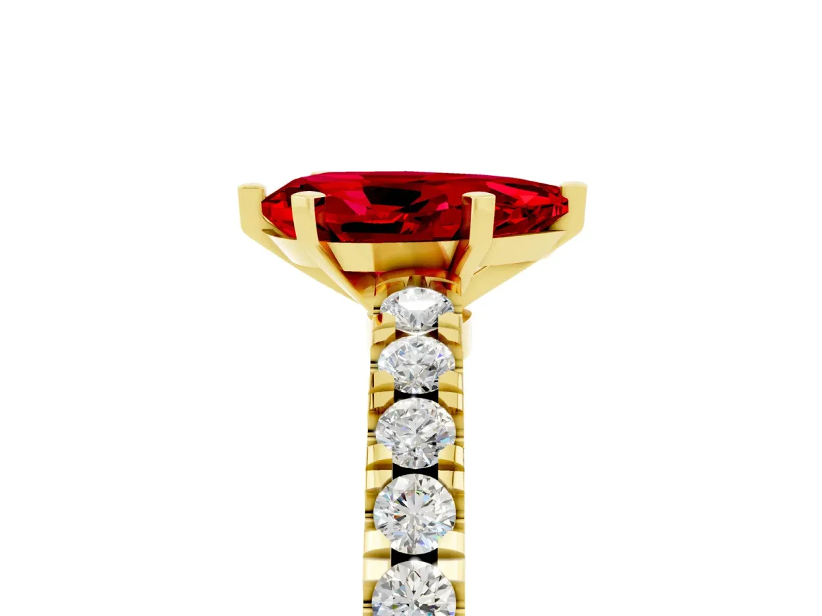 Pear Cut Solitaire Ruby with Pavé Band and Four-Prong Setting Yellow gold