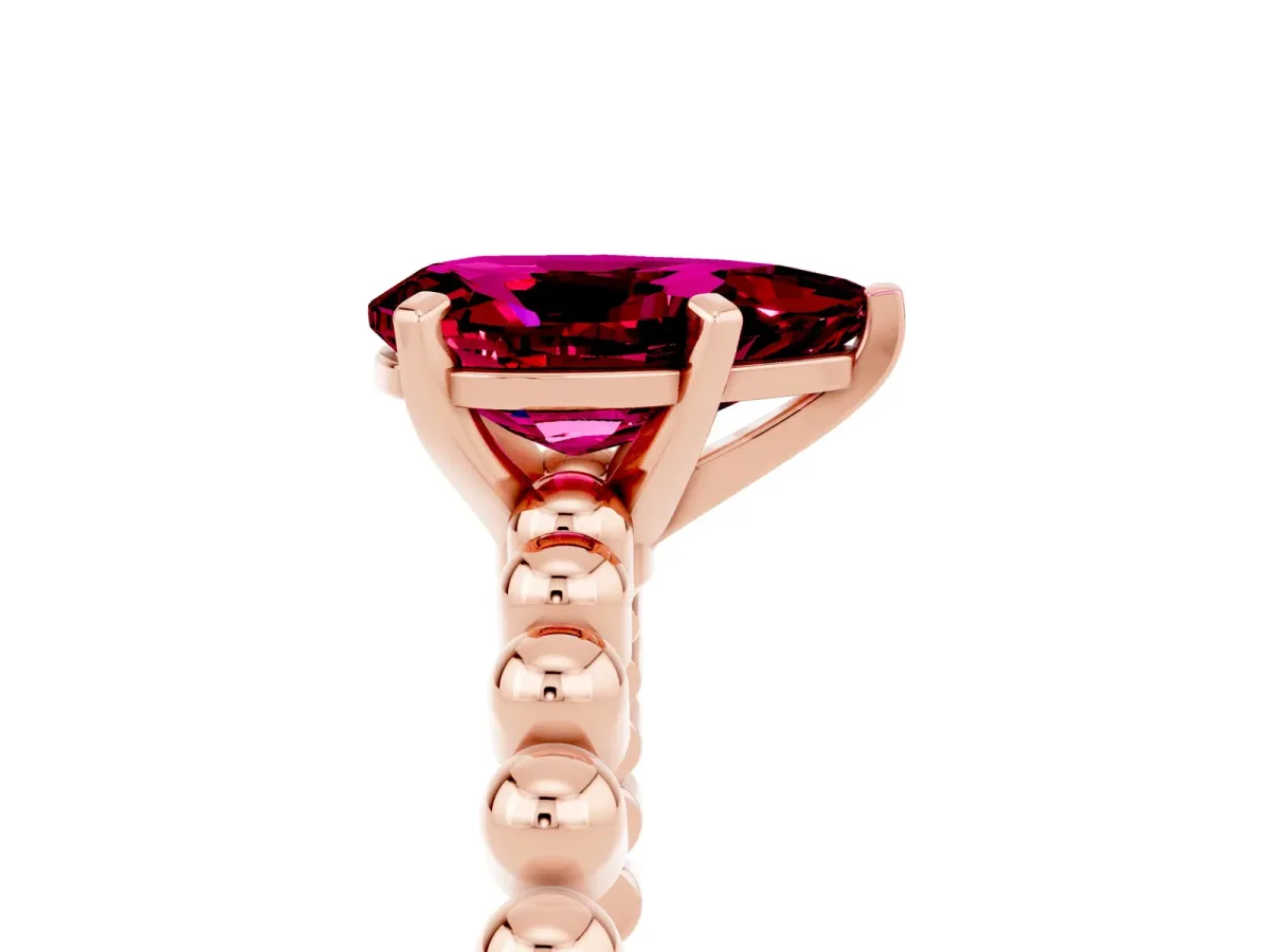 Pear Cut Garnet Solitaire Ring with Beaded Band and Prong Setting Rose gold