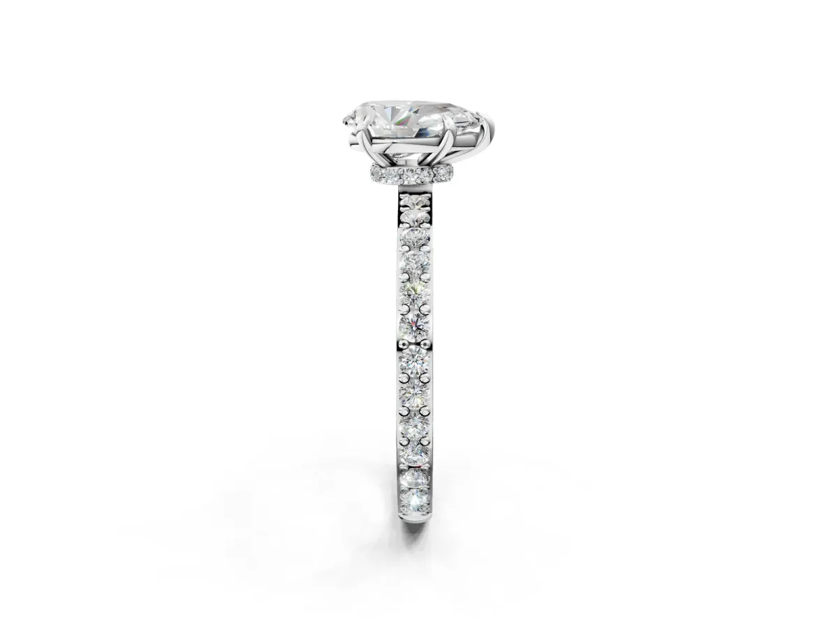 Pear Cut Diamond Solitaire Engagement Ring with Pavé Band and Four-Prong Setting Silver