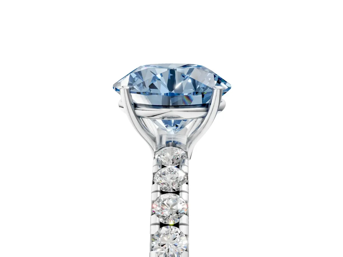 Fancy Blue Round Cut Diamond Pavé Solitaire Engagement Ring with Four-Prong Setting Silver