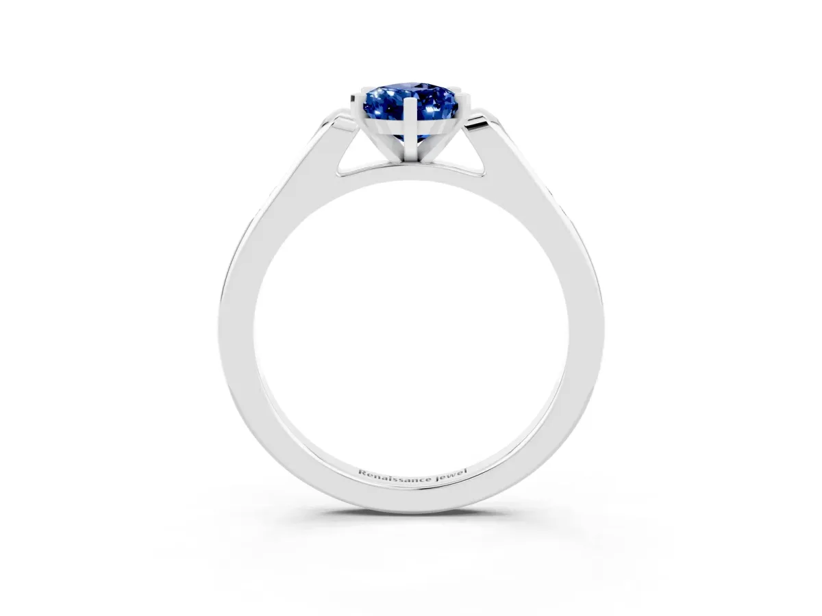 Pear Cut Blue Sapphire Solitaire Ring with Channel Set Round Band and Prong Setting Silver