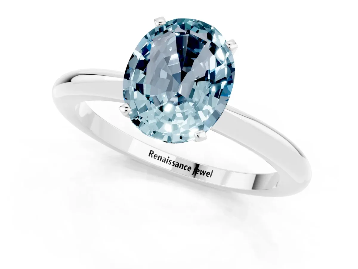 Oval Cut Aquamarine Solitaire Ring with Six-Prong Setting and Classic Band Silver