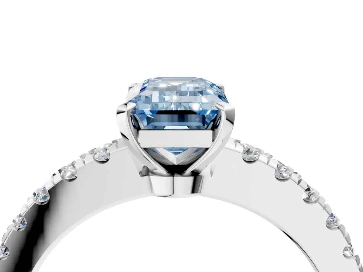 Fancy Blue Emerald Cut Solitaire Diamond with Pavé Band and Four-Prong Setting Silver