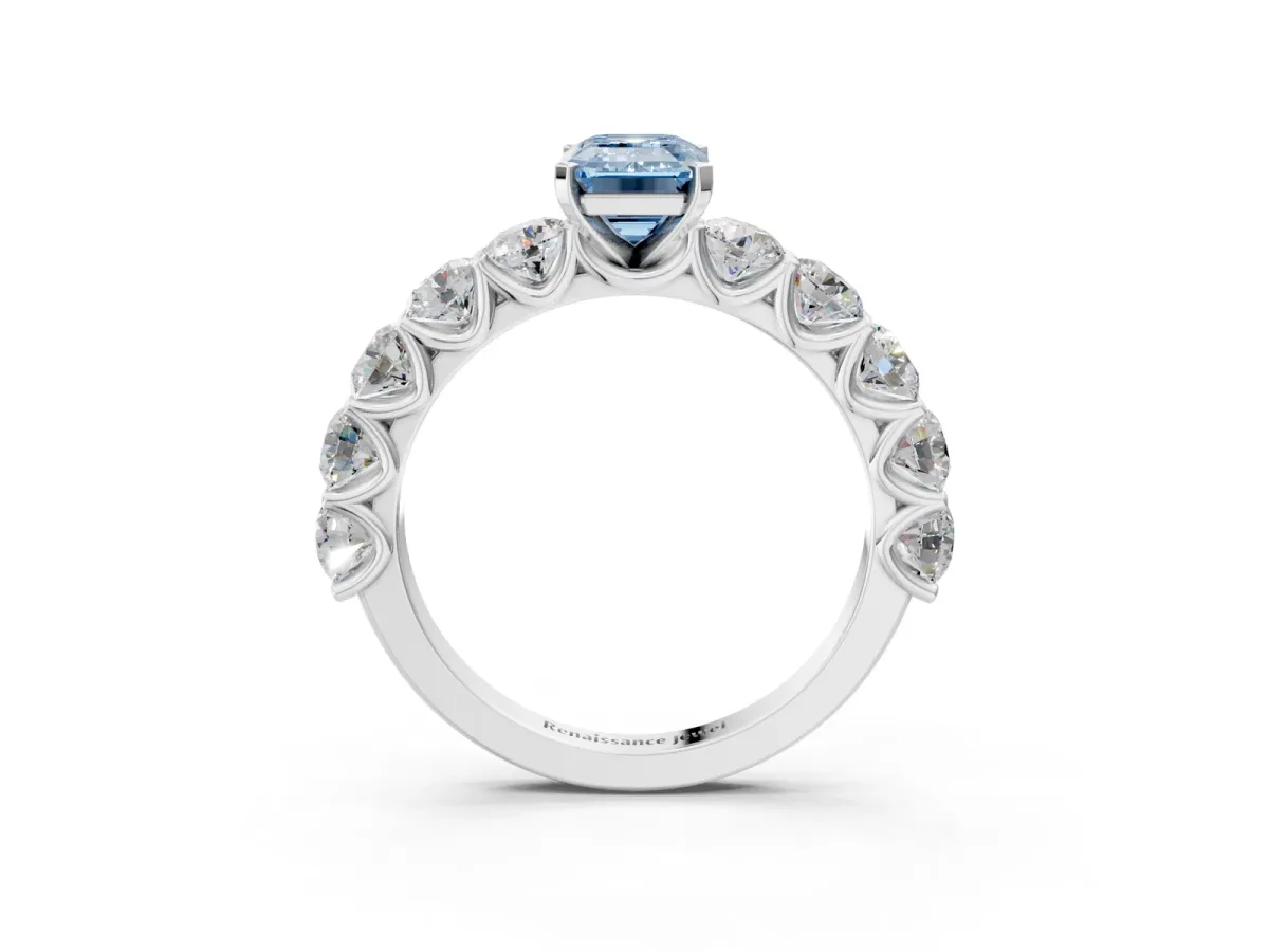 Fancy Blue Emerald Cut Diamond Prong Setting with Side Stones on a Pave Band Silver