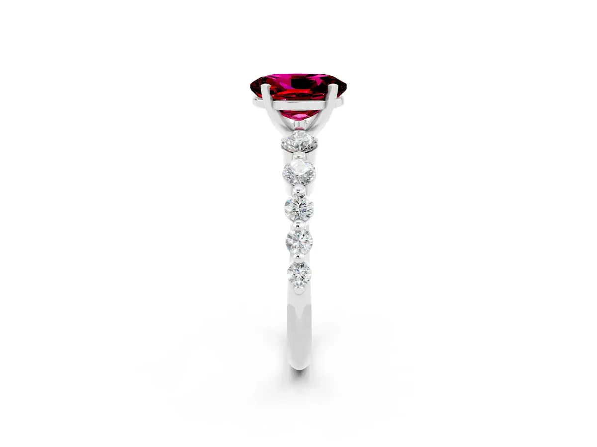 Oval Cut Solitaire Garnet Ring with Pave Band and Four-Prong Setting Silver