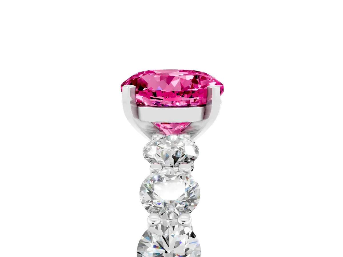 Round Cut Pink Sapphire Prong Setting with Side Stones on a Pave Band Silver