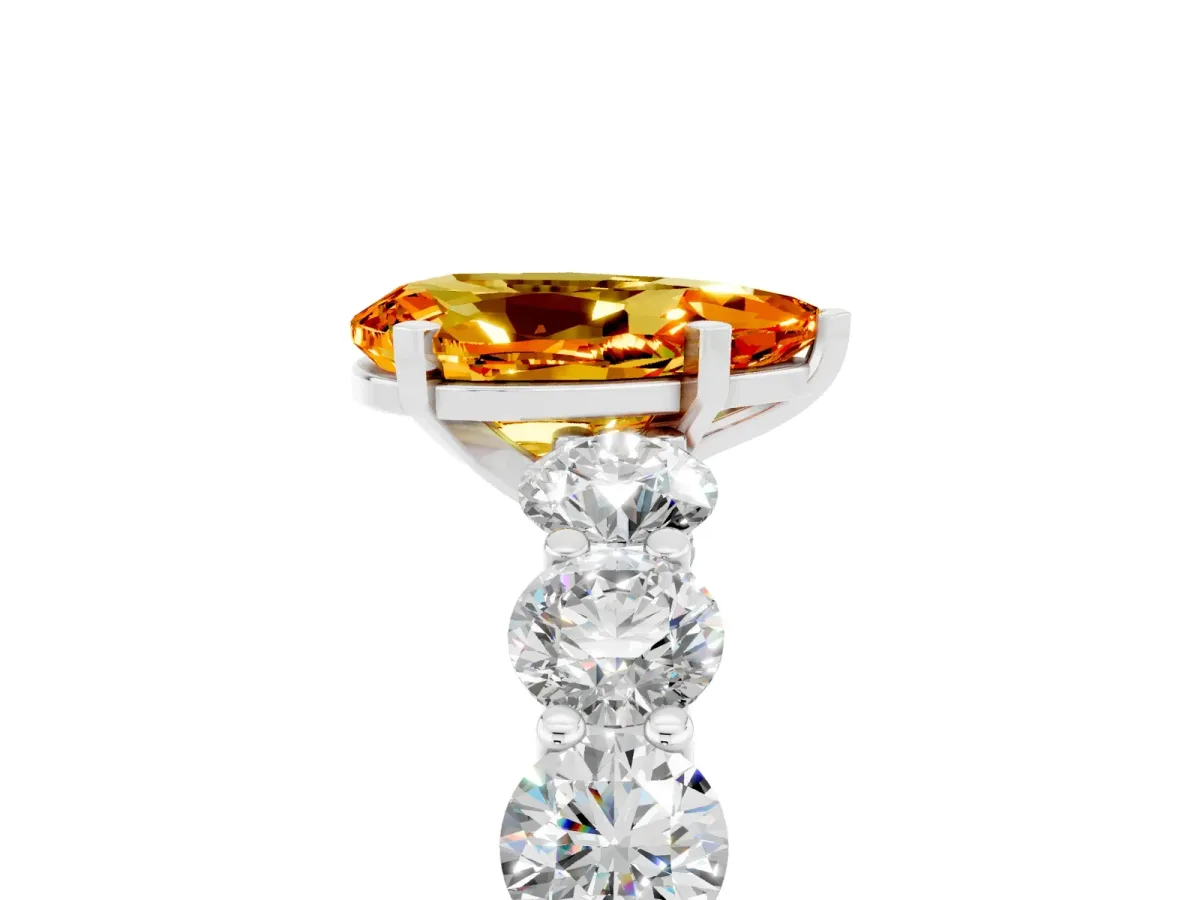 Pear Cut Citrine Prong Setting with Side Stones on a Pave Band Silver