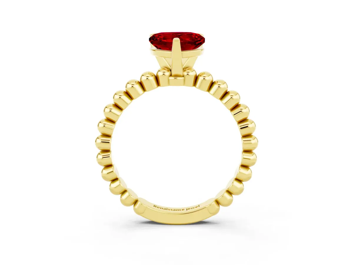 Heart Cut Ruby Solitaire Ring with Beaded Band and Prong Setting Yellow gold